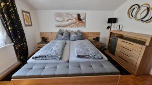 Letto o letti in una camera di s'KLINGI-Haus