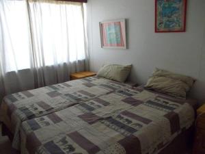 Postel nebo postele na pokoji v ubytování 17 Casablanca