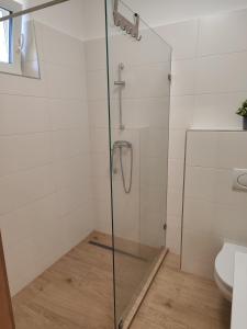Koupelna v ubytování SzeCu Apartmanház