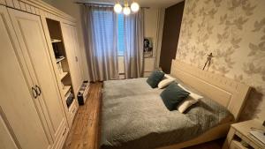 En eller flere senge i et værelse på 3 Rooms APARTMENT