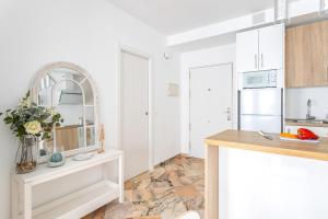 Kuchnia lub aneks kuchenny w obiekcie OleHolidays 315 Romana Playa primera linea playa