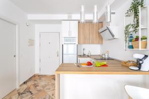 Kuchnia lub aneks kuchenny w obiekcie OleHolidays 315 Romana Playa primera linea playa
