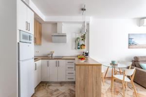 Kuchnia lub aneks kuchenny w obiekcie OleHolidays 315 Romana Playa primera linea playa