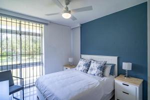 Ένα ή περισσότερα κρεβάτια σε δωμάτιο στο K4 La Ballito