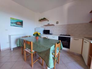 Køkken eller tekøkken på Appartamento con vista mare