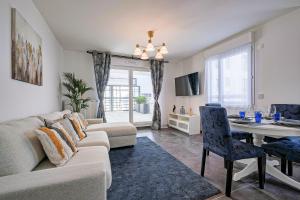 TV a/nebo společenská místnost v ubytování Eden Park - Appartement Terrasse