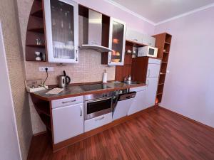 Kuchyň nebo kuchyňský kout v ubytování Jurincom apartmens Zamecky Vrch