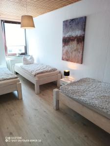 Postel nebo postele na pokoji v ubytování Ferienwohnung Großdobritz
