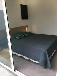 Postel nebo postele na pokoji v ubytování Mon petit coin de paradis