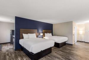 Katil atau katil-katil dalam bilik di MainStay Suites Bourbonnais - Kankakee