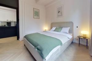 Postel nebo postele na pokoji v ubytování Apartament na Grochowej Centrum