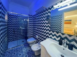 Koupelna v ubytování Palazzo Mauro Sorrento Luxury Rooms + 23 fotografií
