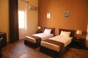 Krevet ili kreveti u jedinici u okviru objekta Gresham Hotel