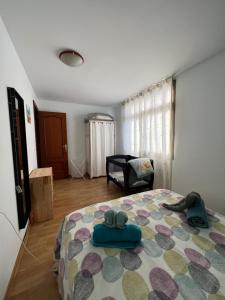 Łóżko lub łóżka w pokoju w obiekcie Casa Gino