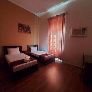 Krevet ili kreveti u jedinici u okviru objekta Gresham Hotel