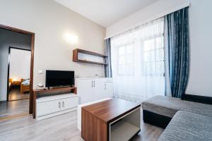 TV a/nebo společenská místnost v ubytování Resort Lesák