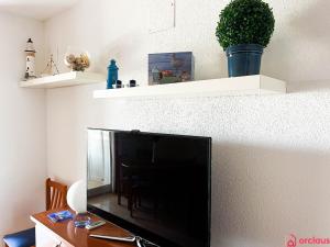 TV a/nebo společenská místnost v ubytování Acapulco Paradise 1era Línea