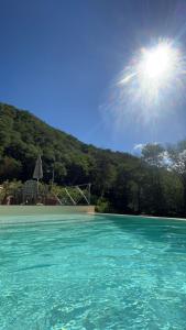 a view of the ocean with the sun in the sky at Casa vacanze Raggio di Sole in Grotte