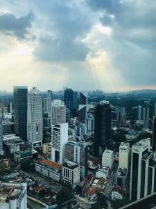 an aerial view of a city with tall buildings at KLCC Ritz Residence Platinum in Kuala Lumpur