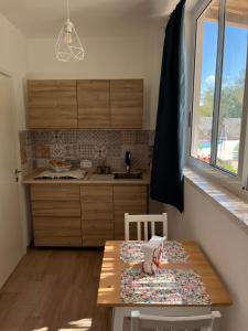 Kuchyň nebo kuchyňský kout v ubytování Trulli bella vite
