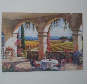 a painting of a patio with a table and chairs at Pousada Beach Eco House Floripa Com Ar Condicionado in Florianópolis