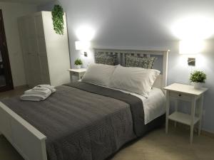 Un pat sau paturi într-o cameră la Casa Turchese Unmarediblu