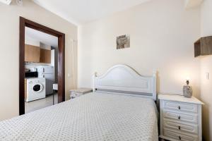 Postel nebo postele na pokoji v ubytování Apartamento da Praia