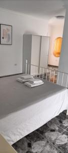 Łóżko lub łóżka w pokoju w obiekcie Gota de Mar