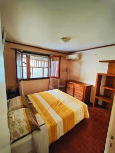 Postel nebo postele na pokoji v ubytování Chalet Combava