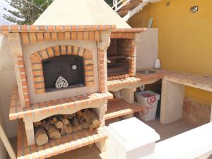 a model of a gingerbread house with a fireplace at Adosado en Costa Calma in Costa Calma