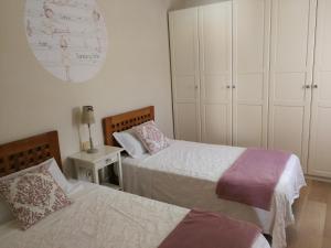 a bedroom with two beds at Adosado en Costa Calma in Costa Calma