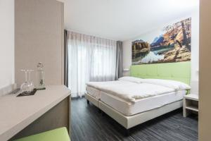 Krevet ili kreveti u jedinici u okviru objekta Adhhoc Hotel