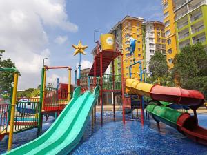 a playground with a slide and a water park at Anastays Studio & Apartment Suite with Free 2 & 4 Waterpark Tickets at Bayou Lagoon Resort in Ayer Keroh