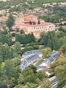 an aerial view of a large building with trees at Casa del Concejo in Segovia