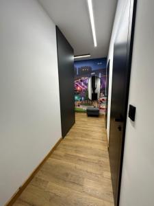 a hallway in a office building with a long corridor at 8Flor Sokolska 30 Katowice in Katowice