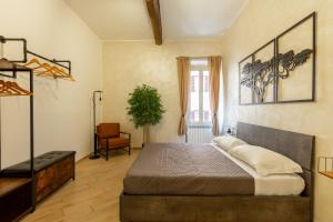 a bedroom with a large bed in a room at Maison Piazza di Spagna in Rome +26 photos
