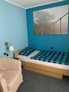 Postel nebo postele na pokoji v ubytování Bartels Stadt-Hotel