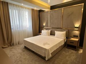Postel nebo postele na pokoji v ubytování Istanblu Hotel Ataşehir