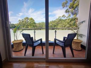 Rõdu või terrass majutusasutuses Hotel NT Grand Yercaud