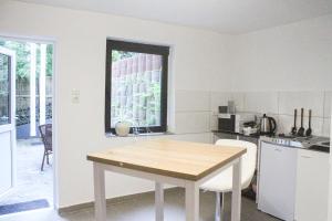 Kuchyň nebo kuchyňský kout v ubytování Ferienhaus Seilerbahn 17