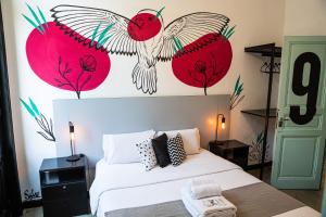 Postel nebo postele na pokoji v ubytování Art Factory Soho