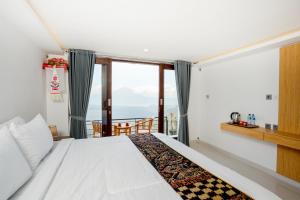 Postel nebo postele na pokoji v ubytování Tegal Sari Cabin Kintamani