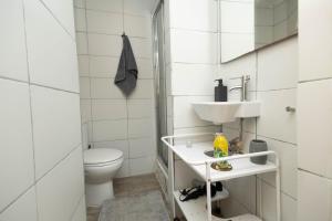 Koupelna v ubytování Olympo Shared flat with Amazing River view