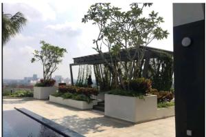 a view of a building with trees and plants at PANGSAPURI MIDAS in Johor Bahru