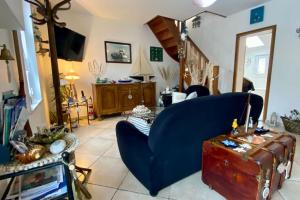 Telewizja i/lub zestaw kina domowego w obiekcie Gîte Etienne Marie