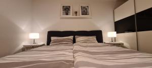 Postel nebo postele na pokoji v ubytování Ferienapartment Wilma
