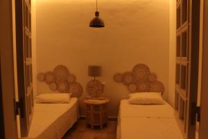 Łóżko lub łóżka w pokoju w obiekcie Beach Apartment - Benalmadena Costa