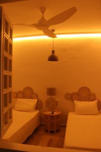 Łóżko lub łóżka w pokoju w obiekcie Beach Apartment - Benalmadena Costa
