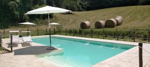 Bazén v ubytování Agriturismo I Melograni nebo v jeho okolí