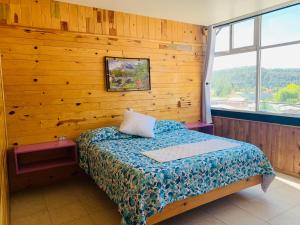 Postel nebo postele na pokoji v ubytování Rimusa Inn